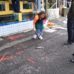 a fish escaped. so it had to be beaten. our drivers looked on, and some dude climbed the fish tanks.